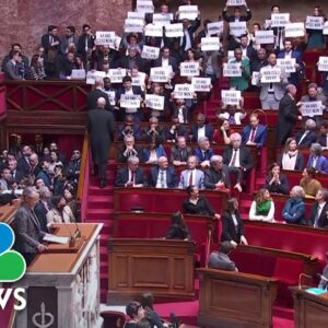 Macron’s proposed pension changes disrupted by rowdy French lawmakers