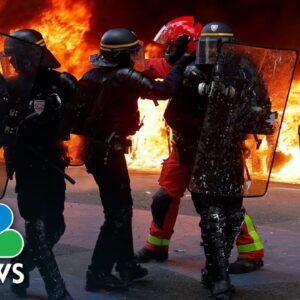 Paris police fire tear gas as May Day pension protests turn violent